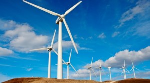 Wind turbines farm on sunset in winter